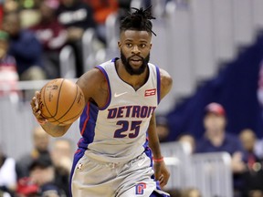 Reggie Bullock #25 of the Detroit Pistons dribbles the ball against the Washington Wizards in the first half at Capital One Arena on January 21, 2019 in Washington, DC.