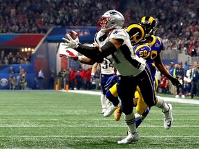 Rob Gronkowski of the New England Patriots catches a 29-yard reception in the fourth quarter against the Los Angeles Rams during Super Bowl LIII at Mercedes-Benz Stadium on February 03, 2019 in Atlanta, Georgia.