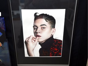 An exceptional water colour by young artist Katia Scandale is displayed at the Teen Art Show at the Walkerville Artists Co-op Friday. Scandale's work is titled Hero Fiennes-Tiffin.  In all, 62 pieces are being judged from young artists, 13-18 years of age.