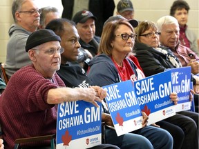 Unifor members Larry Breen, left, Winston Reid, Angela Ciolli, Frank Ciolli, Antonena Guarini and Marco Guarini, listen to NDP MPs Tracey Ramsey (Essex), Brian Masse (Windsor-West) and Cheryl Hardcastle (Windsor Tecumseh), during a press conference at Unifor's union hall on Turner Road where the members of parliament and union leaders urged the federal government not to purchase vehicles built in Mexico.