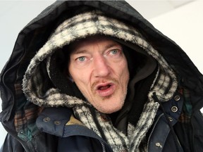 Out of the bitter cold but still covered with multiple layers of clothing, a homeless John Rollo expressed his thanks on Thursday to the student who paid for his hotel room for the night and even drove him to the motel. Rollo did not get the name of the woman but said "she's an angel from heaven."