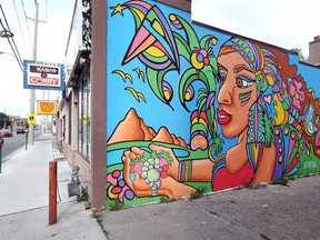 A mural by Windsor artist Athena (Briana Benore) at 343 Wyandotte St. West. Photographed August 2016.