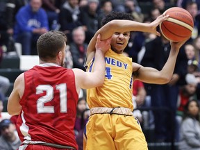 WINDSOR, ON. February 17, 2019. --   Josh Lalonde, left, of Brennan pressures DJ Simonato of Kennedy during their game on Sunday, February 17, 2019, at St.Clair College.