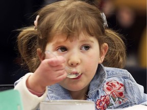 The Empty Bowls Windsor and Essex County fundraiser for area food banks and soup kitchens was held on Sunday, February 10, 2019, at the Optimist Community Centre in Windsor. Julia MacDonald, 4, digs into a bowl of soup during the event.