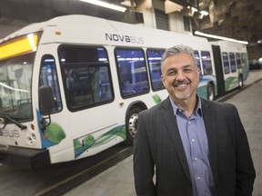 Tony Houad, senior manager for fleet and support services at Transit Windsor, stands next to a new articulated bus at Transit Windsor, Wednesday, February 6, 2019.