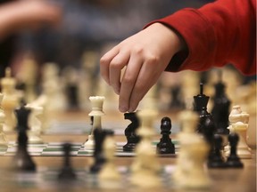 A player makes a move during the 21st Annual Windsor Chess Challenge on Tuesday, February 26, 2019, at the Ciociaro Club. The event attracted over 1,400 elementary school students from  80 schools and is the largest of its kind in Southwestern Ontario.