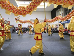 Dragon dancers perform at the Devonshire Mall on Sunday, February 17, 2019, to celebrate Chinese New Year.