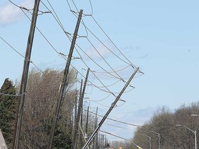 Hydro lines hang over Disputed Road in LaSalle after damaging winds in May 2018.