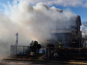 Windsor firefighters respond to a house fire in the 1700 block of Drouillard Road on Feb. 25, 2019.