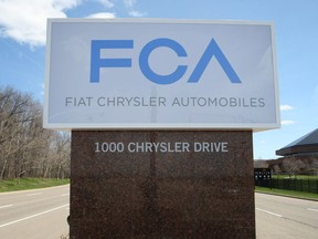 AUBURN HILLS, MI.: MAY 6, 2014 -- The Fiat Chrysler sign is unveiled at Chrysler World Headquarters in Auburn Hills, Mich., Tuesday, May 6, 2014.