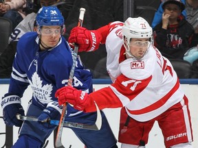 Dylan Larkin of the Detroit Red Wings (right) skates against Auston Matthews of the Toronto Maple Leafs during an NHL game on March 24, 2018 in Toronto. (CLAUS ANDERSEN/Getty Images)