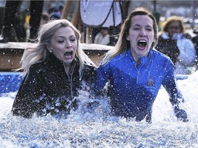 How fun is the Polar Plunge? Just look at the priceless facial expressions of Sarah Carr, left, and Lisa Homenick from the LaSalle Police Service.