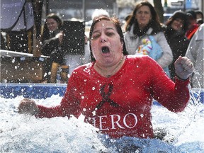 Nice refreshing dip on a cold winter's day. Loredana Vagnini from Caesars Windsor reacts to the cold water during the Windsor-Essex Polar Plunge event on Feb. 15, 2019, at the main campus of St. Clair College. Proceeds assist Special Olympics.