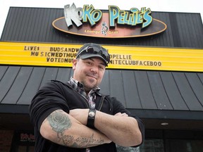 Rob Higgins, former owner of downtown Windsor bar Koko Pellie's, outside the now-defunct business on Feb. 28, 2019. Higgins' recently released country music song This Old Bar is a tribute to the Chatham Street West drinking establishment.