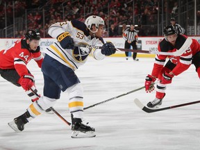 Buffalo Sabres forward Jeff Skinner takes a shot against the New Jersey Devils earlier this month. Skinner is one goal shy of his career-high of 37. (Bruce Bennett/Getty Images)