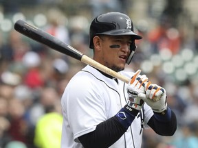 FILE - In this April 21, 2018, file photo, Detroit Tigers' Miguel Cabrera prepares to bat during the third inning of a baseball game against the Kansas City Royals, in Detroit. This will be an important season for Detroit's minor league prospects, and a year from now, Tigers fans might have a better sense of how soon they might be able to watch winning baseball again. In the meantime, Detroit will hope for a healthier season for slugger Miguel Cabrera, who played just 38 games last year before having biceps surgery.