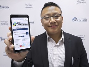 Phil Wong, manager of the Environmental Health Department with the Windsor-Essex County Health Unit, displays a mobile-based web page that the organization launched Thursday, Feb. 7, 2019. The inspection disclosure website allows the public access to recent reports of businesses that the health unit inspected.