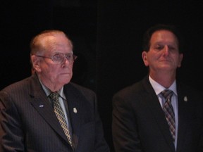 Councillors Hilary Payne and Paul Borrelli, right, during Inaugural Meeting of City Council held at St. Clair College Centre for the Arts' Chrysler Theatre Monday December 1, 2014.