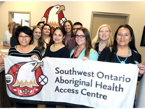 Indigenous community in the Windsor region will have a dedicated office for health care needs following the Grand Opening of Southwest Ontario Aboriginal Health Access Centre on Tecumseh Road West Monday.  In photo, Connie Leslie, left front, executive assistant,  Andrea Racette, RPN, Brooke Wuerch, NP, Shelley Price, NP, and Elayne Isaacs, right, integrated care manager, were joined by staff and invited guests for the official banner raising and ribbon cutting Monday.