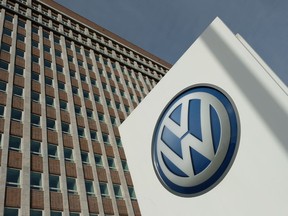 The company logo of automaker Volkswagen AG stands outside Volkswagen headquarters on March 12, 2019 in Wolfsburg, Germany. Volkswagen CEO Herbert Diess said he is committing the company to an electric car future and has set ambitious greenhouse gas reduction goals for the VW by aiming to make the entire company CO2 neutral by 2050.