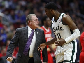 Head coach Tom Izzo of the Michigan State Spartans glares at Aaron Henry after a play during their game in the First Round of the NCAA Basketball Tournament against the Bradley Braves at Wells Fargo Arena on March 21, 2019 in Des Moines, Iowa.
