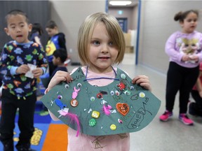 Naveah Scott, 4, was proud of her work creating a dazzling necklace during City of Windsor March Break day camp at Capri Pizzeria Recreation Complex in South Windsor Tuesday.  Day camp visitors worked their way through a variety of activities and games throughout the day.
