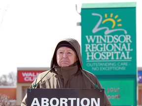 John Brown, a supporter of the anti-abortion 40 Days For Life campaign, stands vigil at Windsor Regional Hospital's Met Campus on March 7, 2019.