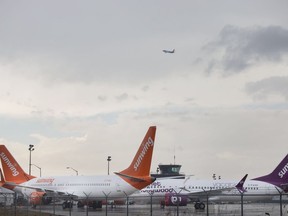 Three of Sunwing's Boeing 737 Max 8's are parked at the Windsor International Airport, Thursday, March 14, 2019, after the fleet is grounded worldwide.