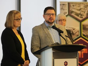 Joe Karb (right), vice president of restorative care at Hotel-Dieu Grace Healthcare, tells a small crowd at the medical facility on Prince Road about research comparing outpatient and outreach patient stroke rehabilitation on Monday, March 25, 2019. Dr. Susan Fox of the University of Windsor's Faculty of Nursing, who will execute the research, stands to the left. The research, which will occur over the next year, will be funded by the Academic Research Committee's Partners in Research Seed Grant.