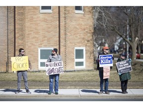 Pro-choice and anti-abortion protesters wage duelling rallies on Tecumseh Road East in front of Windsor Regional Hospital - Met Campus, March 23, 2019.
