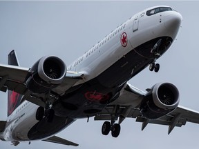 An Air Canada Boeing 737 Max aircraft arriving from Toronto prepares to land at Vancouver International Airport in Richmond, B.C., on Tuesday, March 12, 2019.