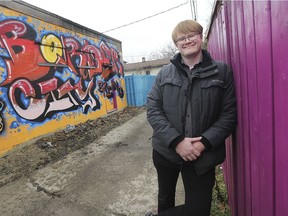 Frazier Fathers Director, Continuous Improvement and Advocacy at United Way Windsor- Essex County is shown in an alley off Drouillard Road on Thursday, March 21, 2019. He authored a report on city alleys and their potential use.