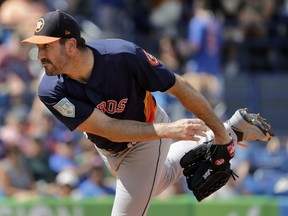 Houston Astros starting pitcher Justin Verlander throws during the first inning of an exhibition spring training baseball game against the New York Mets, Saturday, March 2, 2019, in Port St. Lucie, Fla.