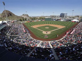 Fans fill most of the seats at Tempe Diablo Stadium, the Los Angeles Angels' spring stadium ballpark, during the team's spring training baseball game against the Chicago Cubs on Tuesday, March 5, 2019, in Tempe, Ariz.
