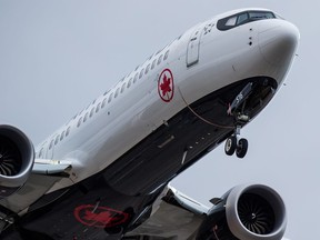 An Air Canada Boeing 737 Max aircraft arriving from Toronto prepares to land at Vancouver International Airport in Richmond, B.C., on March 12, 2019. Boeing's share price has dropped more than 11 per cent – a loss of more than US$26.6 billion – since the plane maker's 737 Max 8 fatally crashed Sunday, but Canada's two largest airlines have emerged nearly unscathed. Air Canada and WestJet Airlines Ltd. saw their stocks decline about 3.4 per cent and 2.5 per cent, respectively, since the Ethiopian Airlines disaster that killed all 157 people on board.