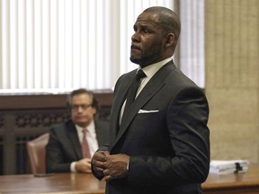 FILE - In this Friday, March 22, 2019 file photo, R. Kelly appears for a hearing at the Leighton Criminal Court Building in Chicago, Illinois. Dubai's government on Sunday forcefully denied a claim by R&B singer R. Kelly that the artist had planned concerts in the sheikhdom after he had sought permission from an Illinois judge to travel here despite facing sexual-abuse charges.