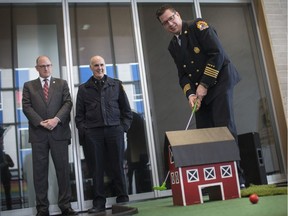 Jamie Waffle, Windsor Fire and Rescue deputy chief of operations makes his putt during a press event announcing the first annual Can-Am Golf Series in support of the 2022 Can-Am Police Fire Games, Thursday, March 21, 2019.  The event takes place June 17, 2019 at Roseland Golf and Curling Club.