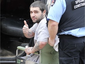 Jesse Ball-Shearon gives the thumbs up as he leaves the Superior Court of Justice building in downtown Windsor, ON. on Wednesday, March 20, 2019, after the abrupt end to a criminal trial that saw him acquitted on an aggravated assault charge stemming from a 2016 incident. DAN JANISSE/The Windsor Star)