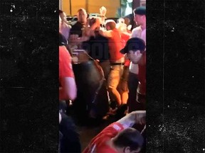 A screen grab taken from TMZ appears to show a man, identified as Dallas Cowboy Tyrone Crawford, engaged in fight in a Florida bar.