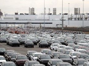 Jeep vehicles are parked outside the Jefferson North Assembly Plant in Detroit on Feb. 26, 2019. Fiat Chrysler announced plans on Tuesday for a new Jeep factory, the city's first new auto plant in a generation, as part of a $4.5 billion manufacturing expansion in southeast Michigan. FCA said it would convert the Mack Avenue Engine factory to an assembly plant for the next-generation Jeep Grand Cherokee and make an investment at Jefferson North Assembly Plant to retool and modernize the factory for continued production of the Dodge Durango.
