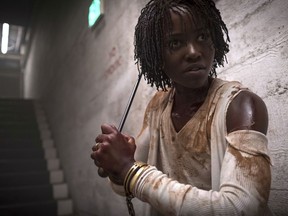 This image released by Universal Pictures shows Lupita Nyong'o in a scene from "Us," written, produced and directed by Jordan Peele.