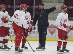 Leamington Flyers head coach Cam Crowder talks to players during a practice on Wednesday prior to Thursday's Western Conference final opener against the London Nationals.
