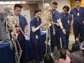 First year nursing students from the University of Windsor teach grade five students from West Gate Public School and Ford City Public School about the human skeletal system during the Healthy Bodies Health Fair, Tuesday, March 26, 2019.