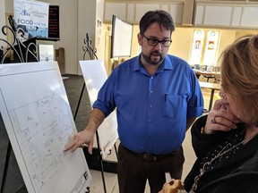 Downtown Mission executive director Ron Dunn shows the renovation floor plan for the organization's future Windsor Public Library home on March 6, 2019, in the mission's chapel.