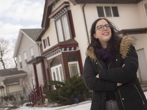 Sarah Morris, volunteer coordinator of Jane's Walk, stands in front of a row of homes on Louis Avenue that are included in the tour taking place in May, Wednesday, March 6,  2019.