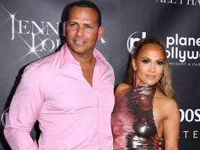 Jennifer Lopez and Alex Rodriguez strike a pose at Caesars Palace in Las Vegas on Sept. 29, 2018.