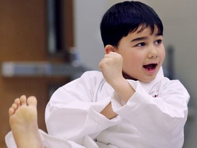 The Transition to Betterness organization hosted their annual Belting Ceremony for the Kids Kicking Cancer Program on Monday, March 18, 2019, at the Hospice of Windsor Essex County. The program teaches the mind-body techniques of Martial arts instruction, breath work and meditation to empower children beyond the pain and discomfort they face. David Ianni, 8, displays some techniques during the event.