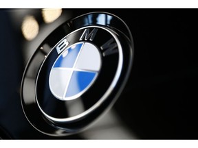 The logo of German car manufacturer BMW is pictured on a BMW car prior to the earnings press conference in Munich, Germany, Wednesday, March 20, 2019.