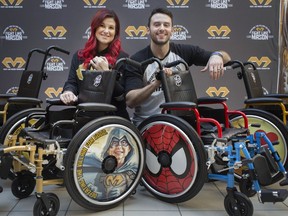 Chantelle Bacon, left, and Iain Macri, parents of Mason Bacon-Macri who passed away as a result of childhood cancer, are pictured with five customized wheelchairs for paediatric patients donated by the Fight Like Mason Foundation to Windsor Regional Hospital - Met Campus, Tuesday, March 26, 2019.