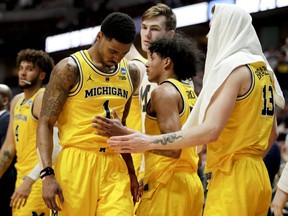 Michigan guard Charles Matthews leaves the court during the team's loss to Texas Tech in an NCAA men's college basketball tournament West Region semifinal on March 28, 2019, in Anaheim, Calif.